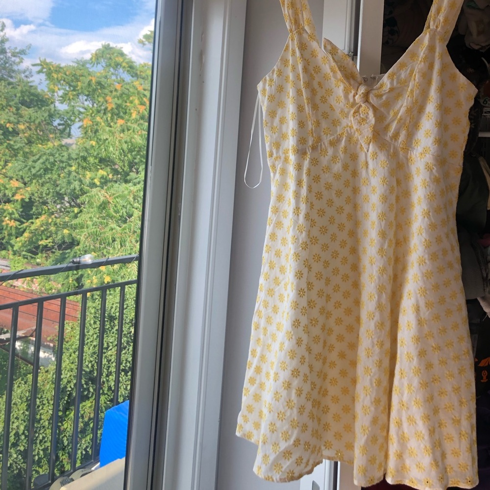 Cute, summer dress! Lightweight, new with tags! NWT White and yellow.